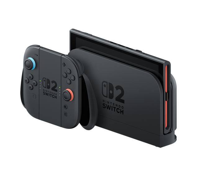 Nintendo Switch 2 i dock og Joy-Con 2-greb set skråt fra siden